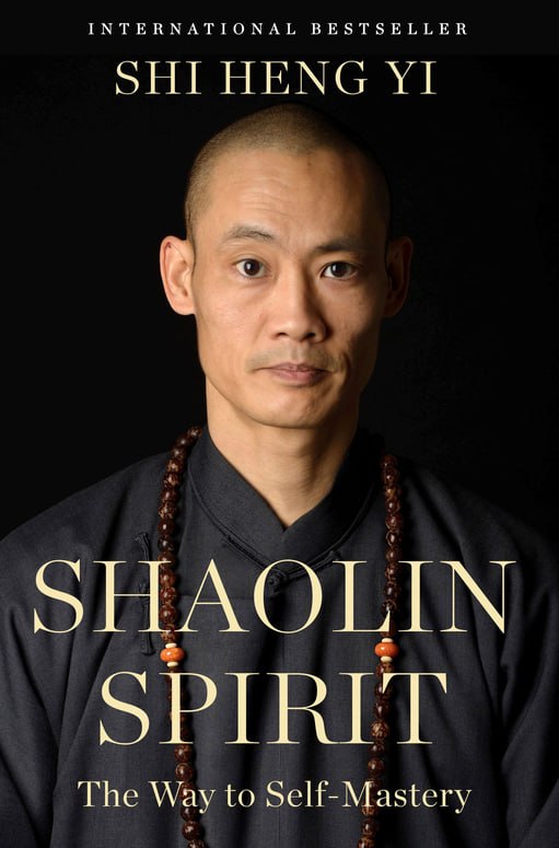 Cover of Shaolin Spirit by Shi Heng Yi, showing him in a dark robe with prayer beads